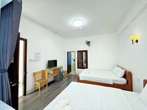Family Room | Desk, free WiFi, individually decorated, bed sheets - New Hotel Vung Tau (Vung Tau)