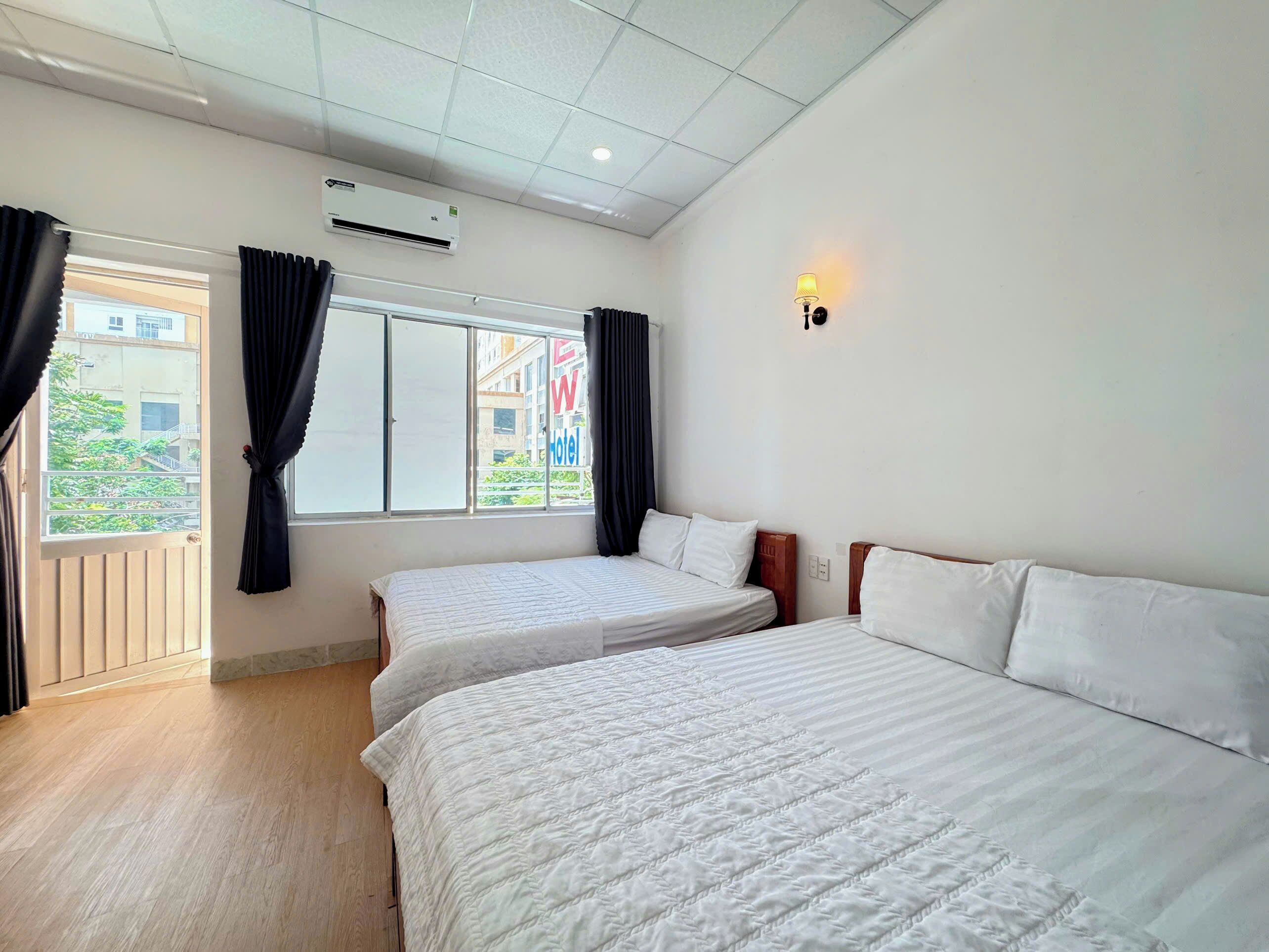 Superior Quadruple Room, City View | Desk, free WiFi, individually decorated, bed sheets