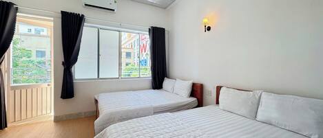 Superior Quadruple Room, City View | Desk, WiFi (free), individually decorated, bed sheets