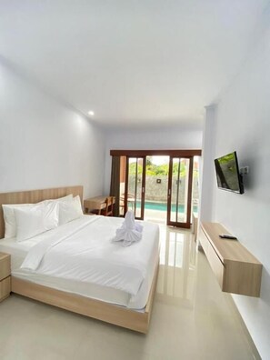 Deluxe Double Room, Balcony, Pool View | Desk, laptop workspace, soundproofing, WiFi (free) - Desri Ubud (Gianyar)