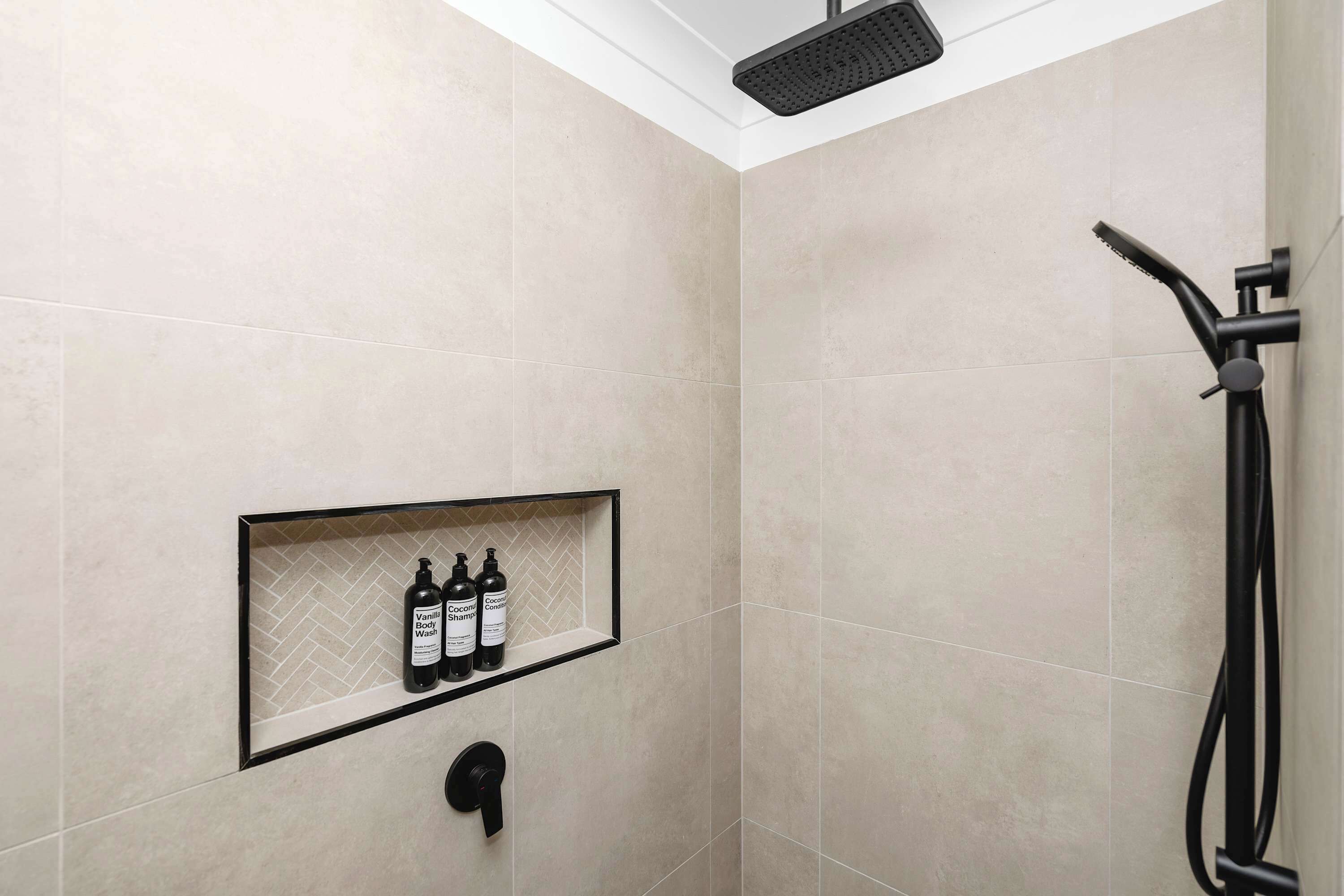 Shower, hair dryer, towels, shampoo