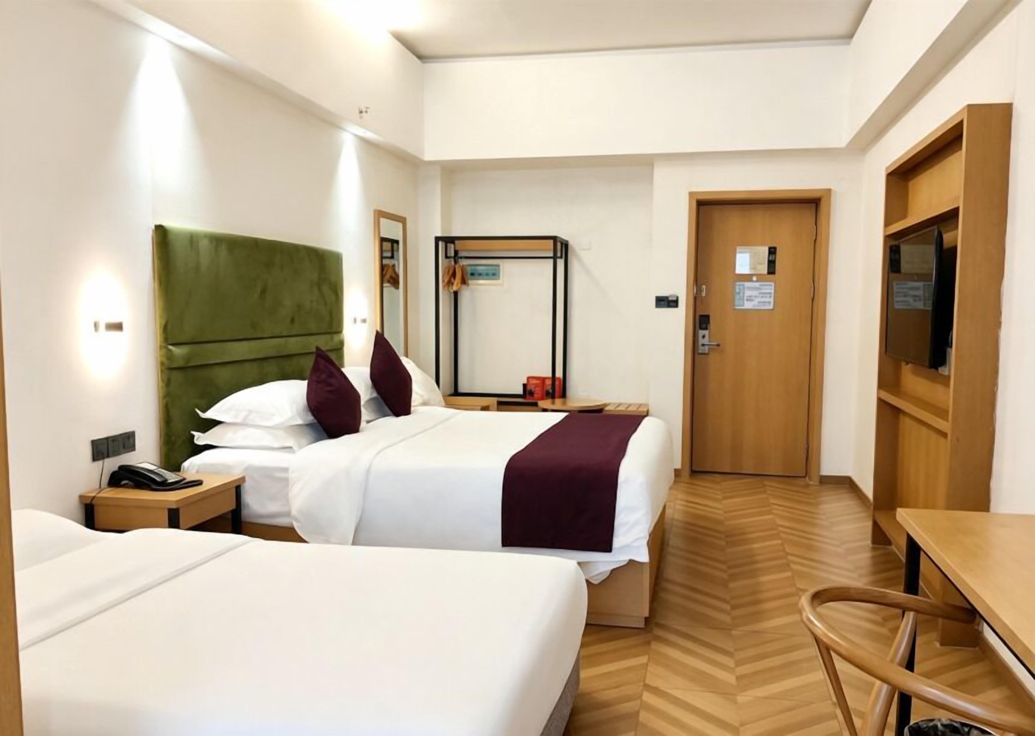 Family Triple Room | Premium bedding, desk, laptop workspace, blackout drapes