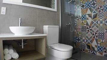 Shower, free toiletries, hair dryer, slippers