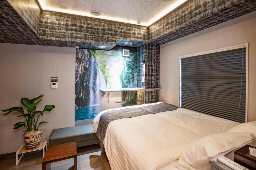 Habitación doble Deluxe, 1 cama matrimonial, para no fumadores, vista parcial al mar | Spa
