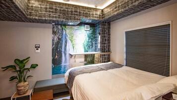 Habitación doble Deluxe, 1 cama matrimonial, para no fumadores, vista parcial al mar | Spa