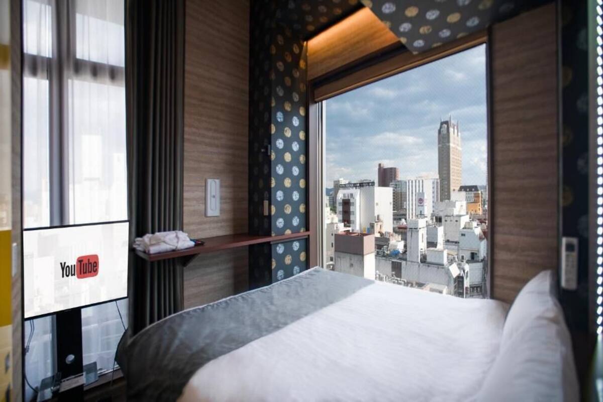 Triple Room, Multiple Beds, Non Smoking, City View | Laptop workspace, WiFi (free)
