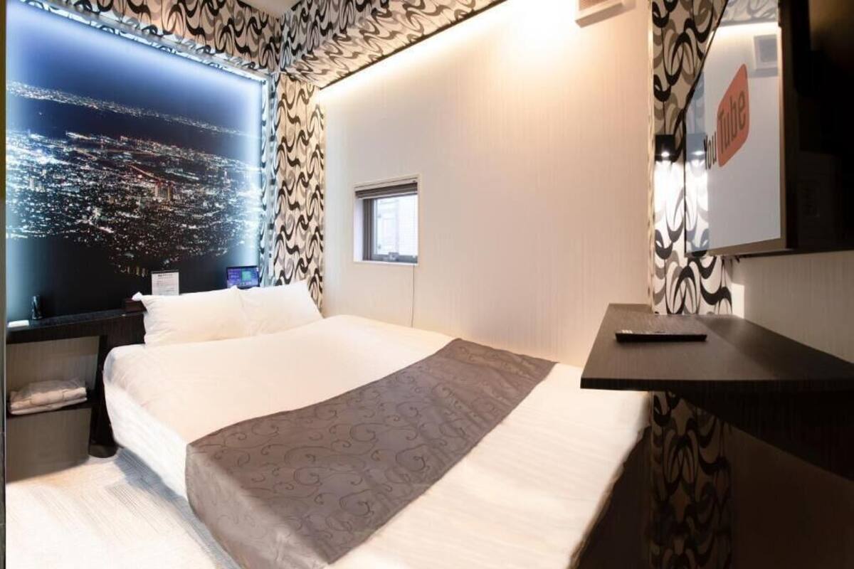 Phòng đôi Deluxe, 1 giường đôi, không hút thuốc, quang cảnh một góc biển | Khu vực làm việc phù hợp cho laptop