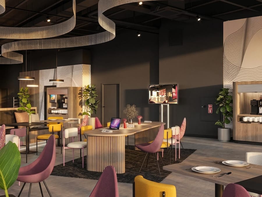 Un restaurante moderno con barra central, varias zonas de estar e iluminación decorativa.