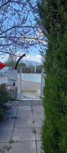 A quiet and spacious country-style group lodging with a pool,
