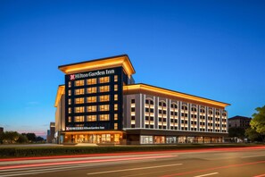 A modern Hilton Garden Inn hotel with a prominent entrance and multiple floors. - Hilton Garden Inn Beijing Fengtai Xiaotun Road (Beijing)