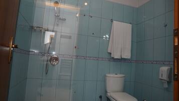 Shower, towels, toilet paper