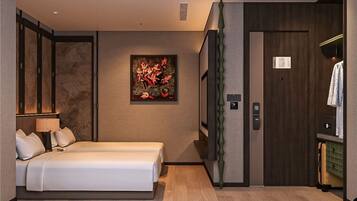 Une chambre d’hôtel avec un lit, un tableau au mur, une armoire et un ascenseur.