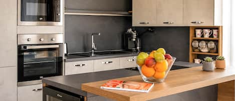 Coffee/tea maker, fridge, microwave, oven