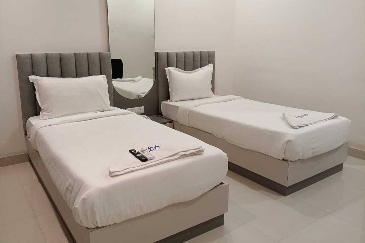 Habitación con 2 camas individuales, vistas a la ciudad | Wifi gratis