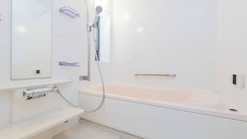 Villa | Bathroom | Combined shower/tub, hair dryer, slippers, towels