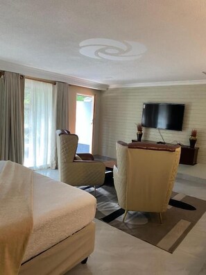Habitación de lujo doble, patio, vistas al jardín | Interior