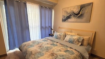 Family Condo, Balcony, Pool View | Desk, laptop workspace, free WiFi