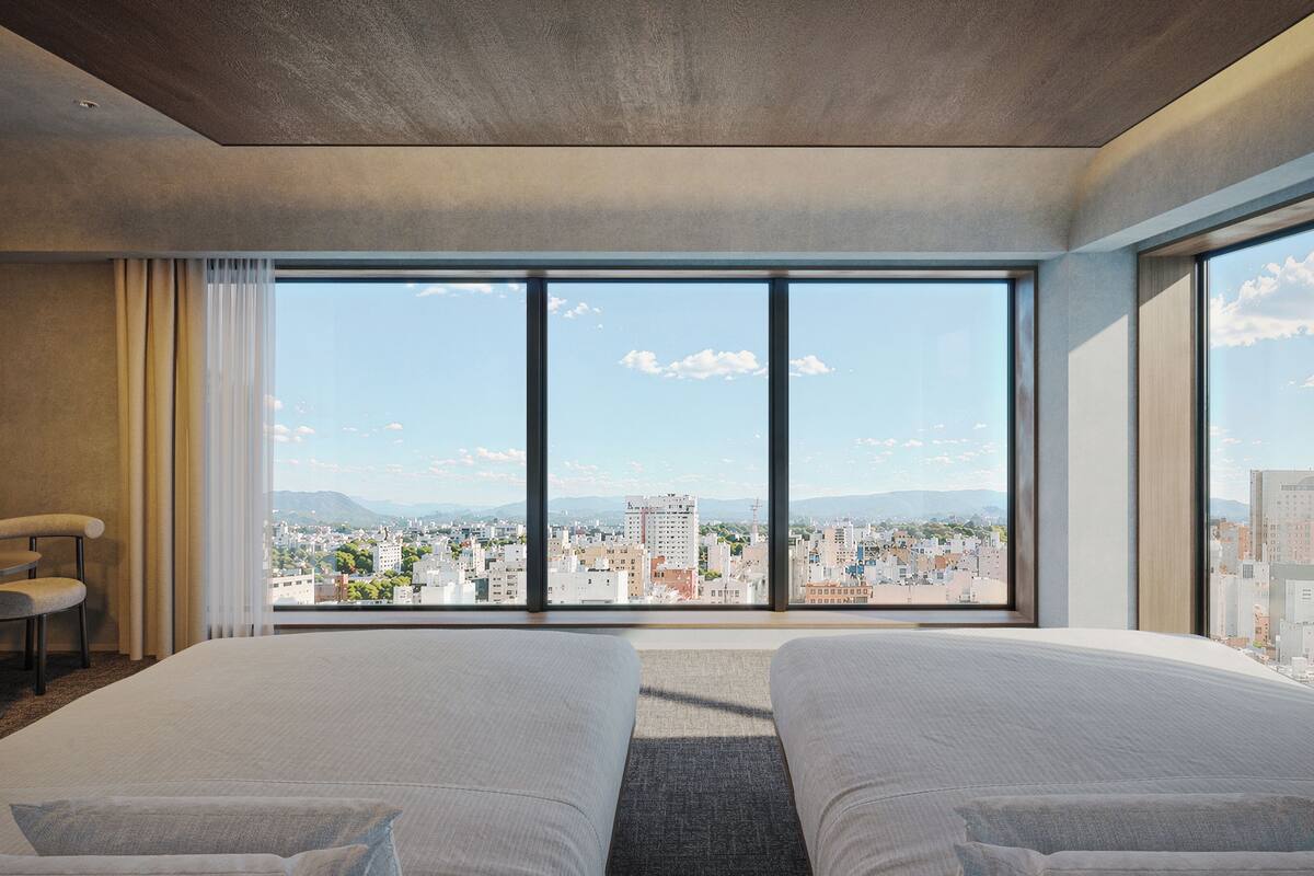 Deluxe Twin Room Non-smoking | In-room safe, WiFi (free), bed sheets