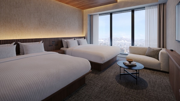 A hotel room with two beds, a sofa, a small table, and a large window offering a city view.