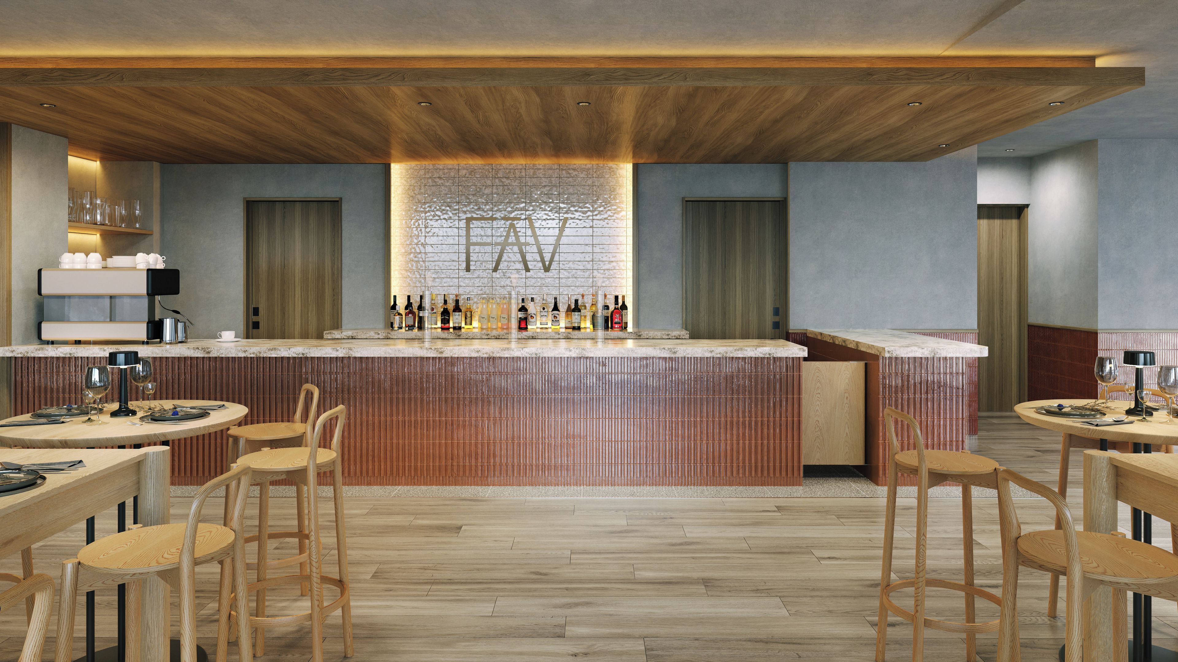 Un espace bar avec un plafond en bois, un mur recouvert de carreaux et une variété de bouteilles. On y trouve des chaises et des tables en bois disposées autour du bar.