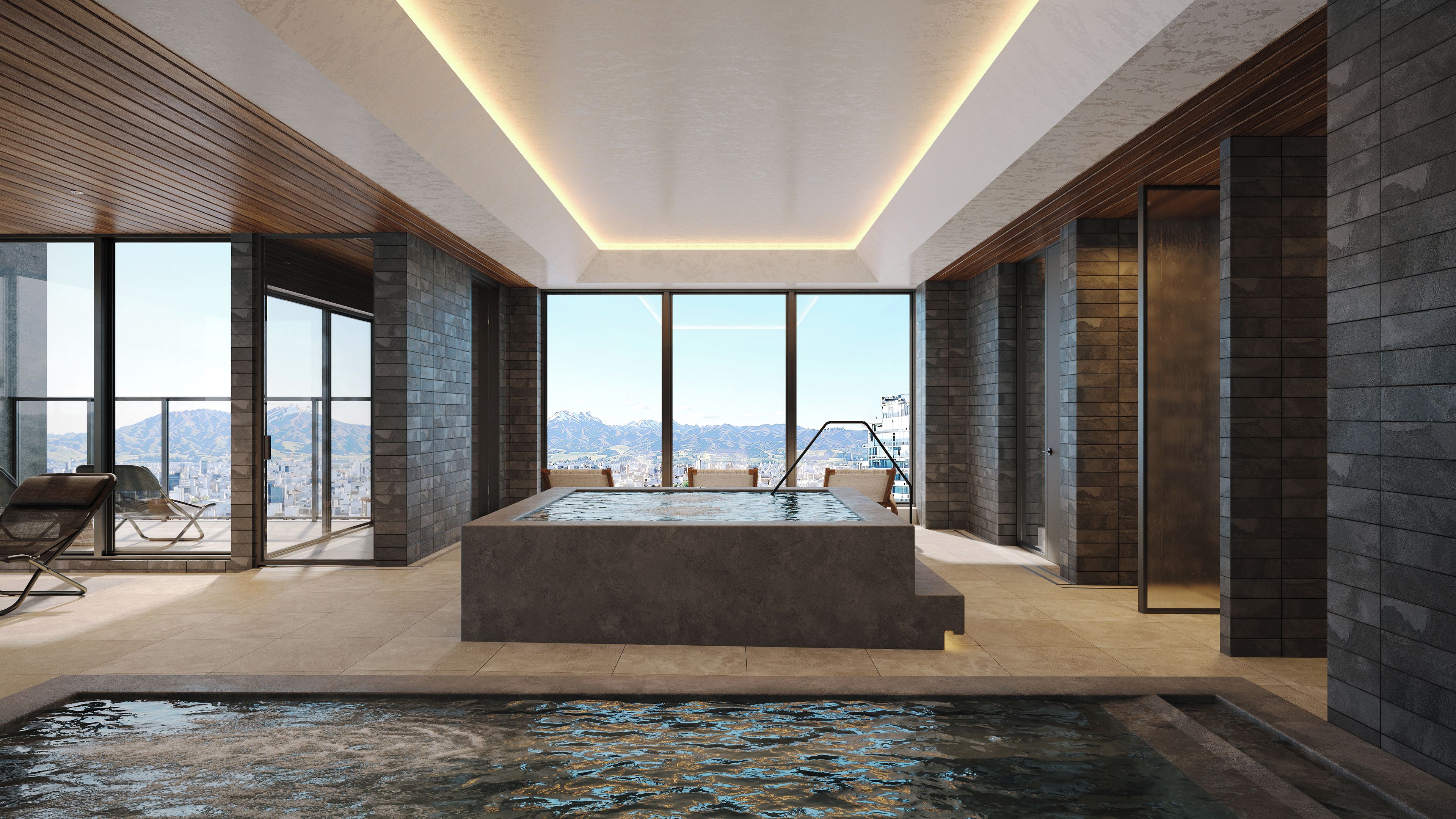 Un intérieur moderne avec une grande baignoire, une vue sur le paysage urbain et un balcon avec un fauteuil.
