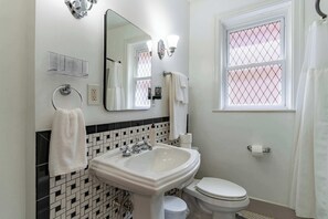 Shower, hair dryer, towels, shampoo