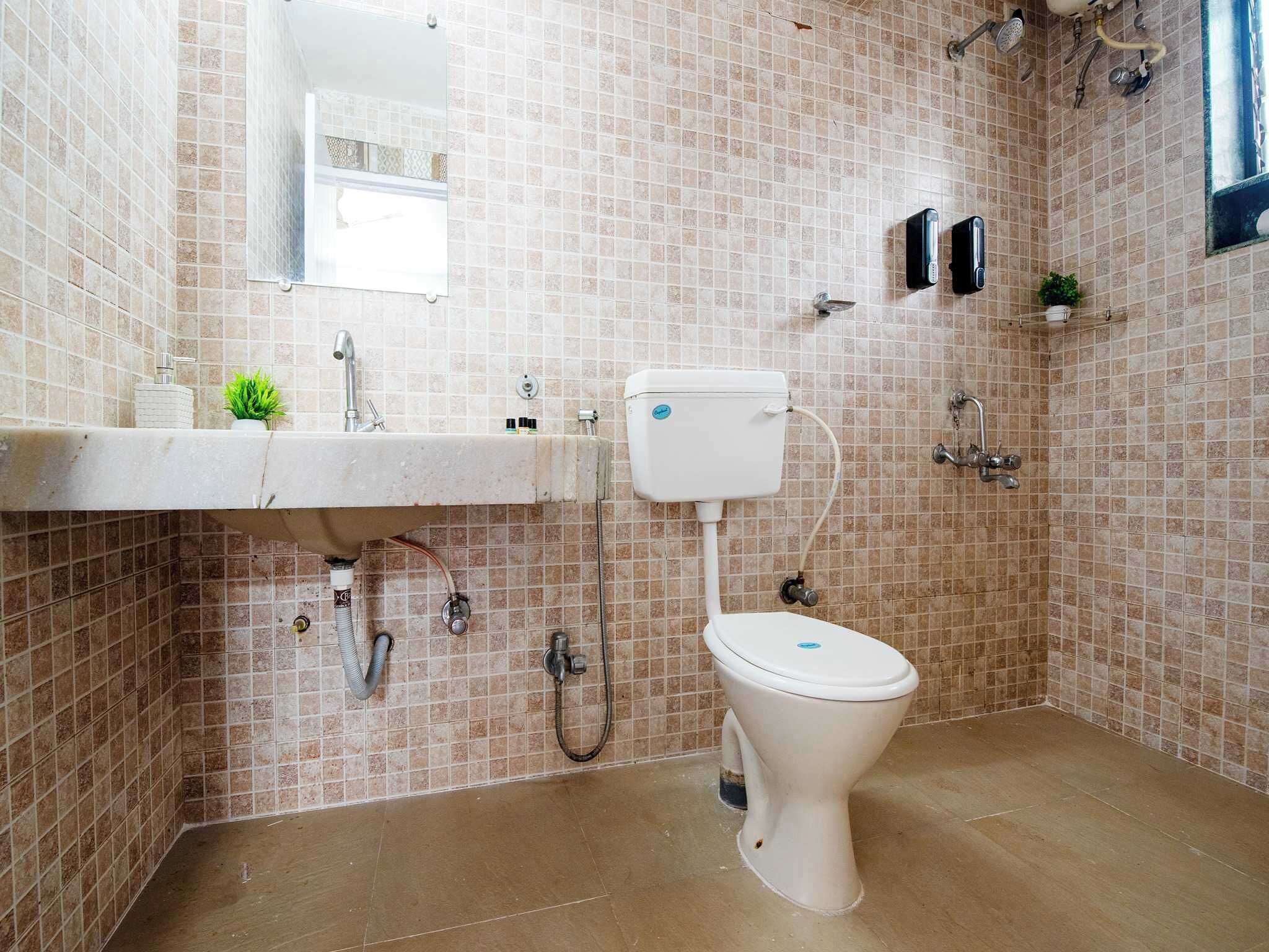 Vila premium | Banheiro | Produtos de toalete grátis, toalhas de banho, sabonete, shampoo