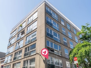 A multi-story building with a modern architectural style, featuring a mix of window types and balconies. - Centrally located Sea You Again by Interhome (Blankenberge)