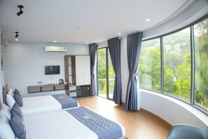 Chambre Quadruple Luxe, balcon, vue plage