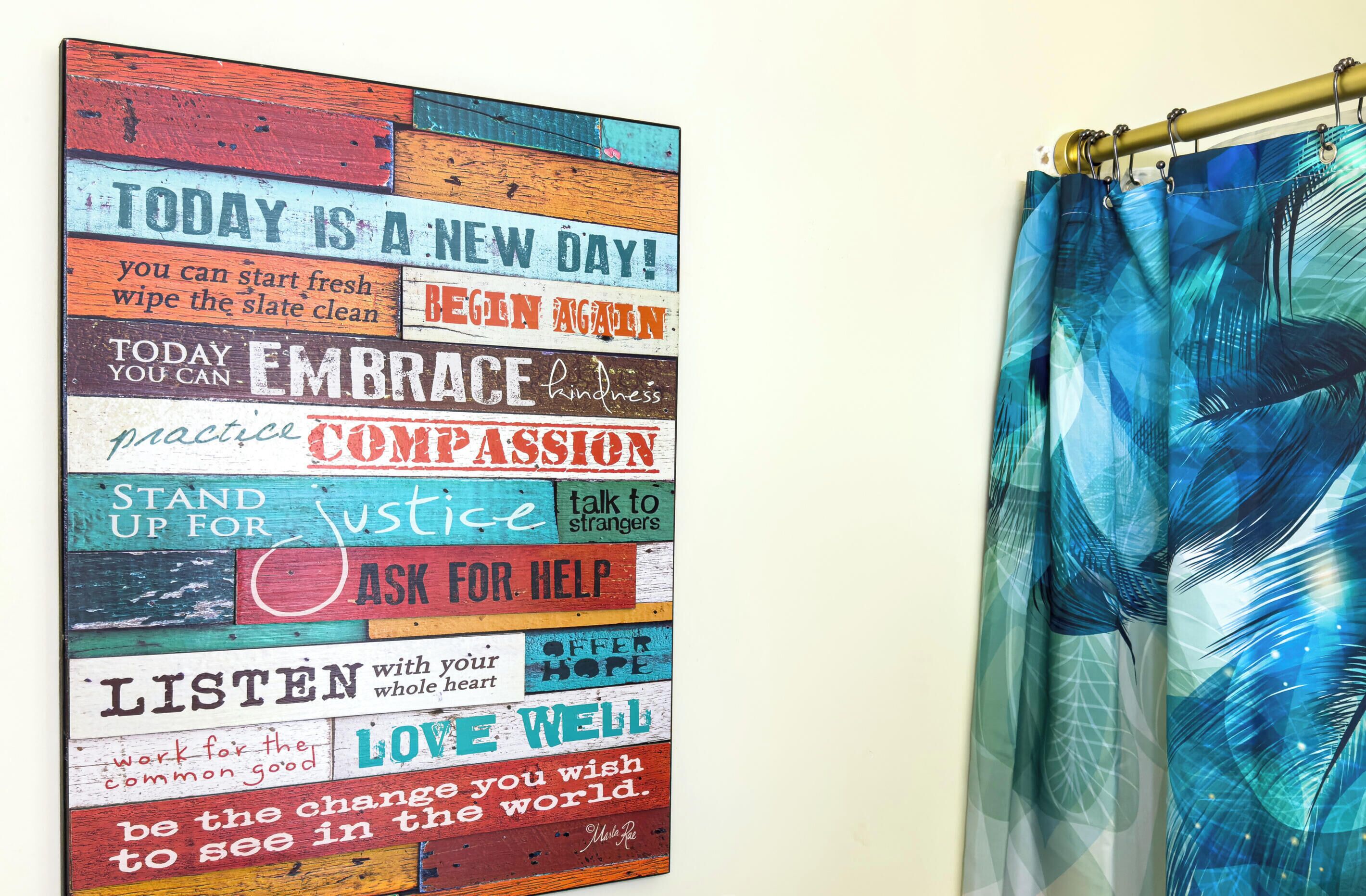 A motivational poster with various inspirational phrases.