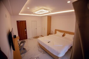 Desk, blackout drapes, rollaway beds (surcharge), WiFi (free)