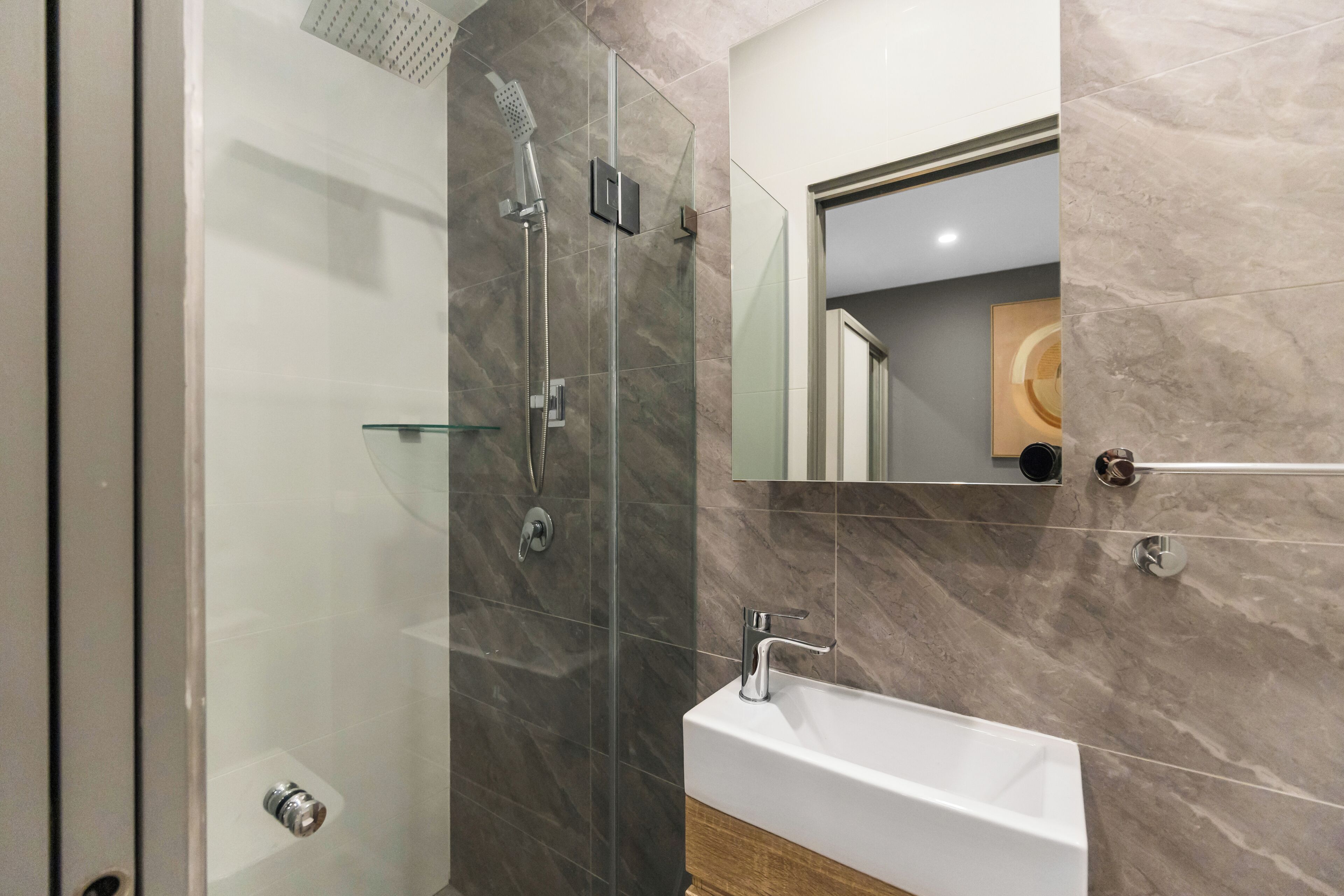 Shower, hair dryer, towels, toilet paper