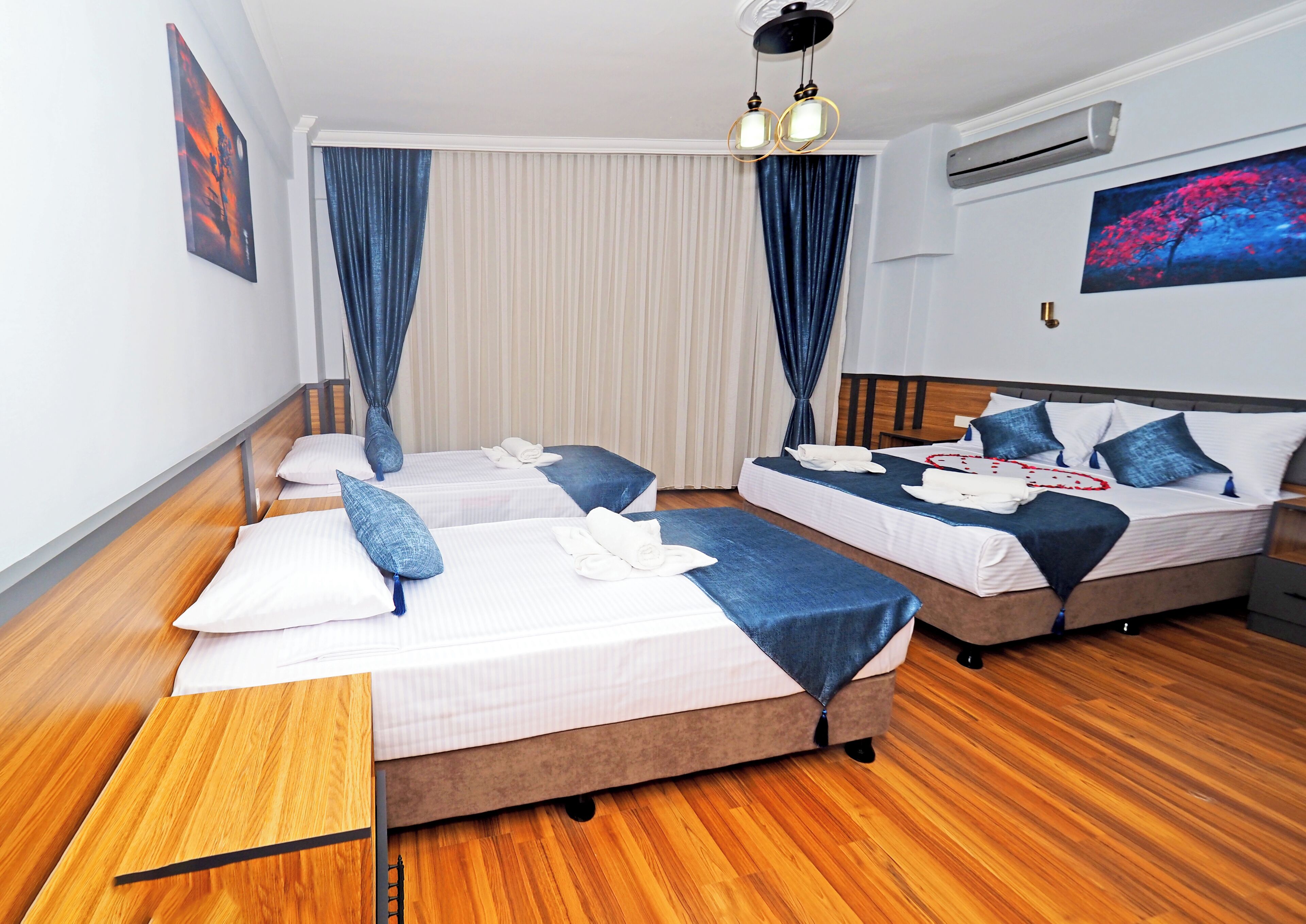 Deluxe-Dreibettzimmer