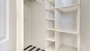 A white interior with a metal rack and white shelves. - Steps to Empire Polo Club: Casita w/ Pool Access (Indio)