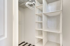 A white interior with a metal rack and white shelves. - Steps to Empire Polo Club: Casita w/ Pool Access (Indio)