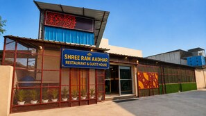 A building with a sign for 'Shree Ram Aadhar Restaurant & Guest House.' - Hotel Shree Ram Adhar (Ayodhya)