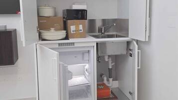 Deluxe appartement, uitzicht op tuin | Interieur