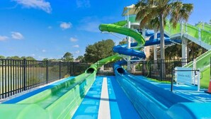 A water park with multiple water slides and a pool area. - Wh7754 - 6BR House With Pool Near Disney (Kissimmee)