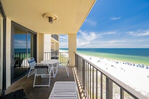A balcony with a view of a beach and ocean. - Phoenix Iii 3085 1 Bedroom Condo (Orange Beach)