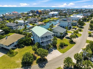 A residential area with houses, a swimming pool, and a marina. - High Cotton: Inlet Views, Private Dock, Pool & Easy Beach Access (Murrells Inlet)