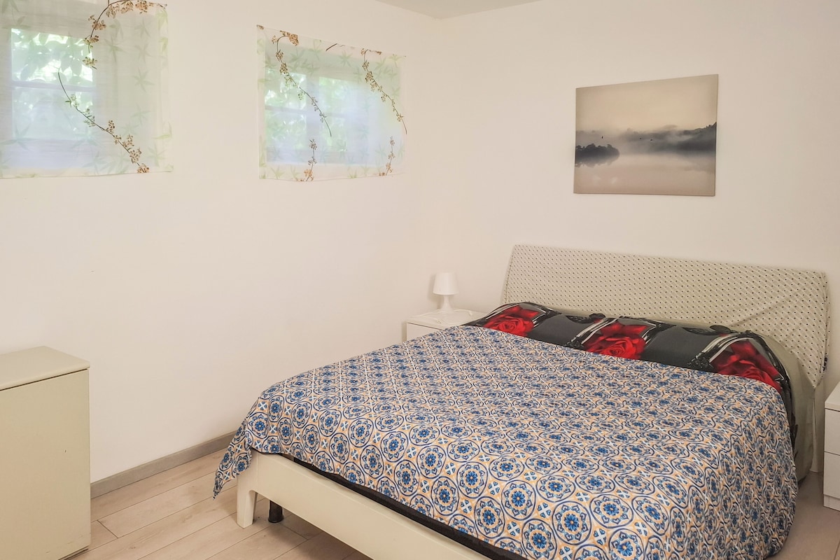 Apartamento | Tabla de planchar con plancha, wifi gratis, ropa de cama