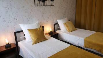 2 dormitorios, tabla de planchar con plancha, wifi y ropa de cama