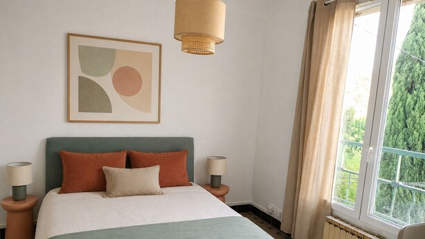 A bedroom with a bed, two bedside tables, a hanging light fixture, a window with curtains, and a wall-mounted abstract painting. - Cozy & bright 2-bedroom apartment - Avignon - 700 m from the city walls (Avignon)