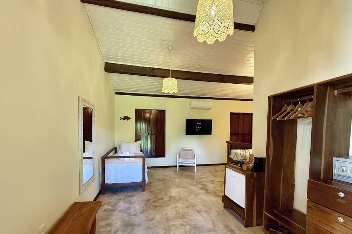 Bungalow familiar, vistas al jardín | Caja fuerte, cortinas opacas, wifi gratis