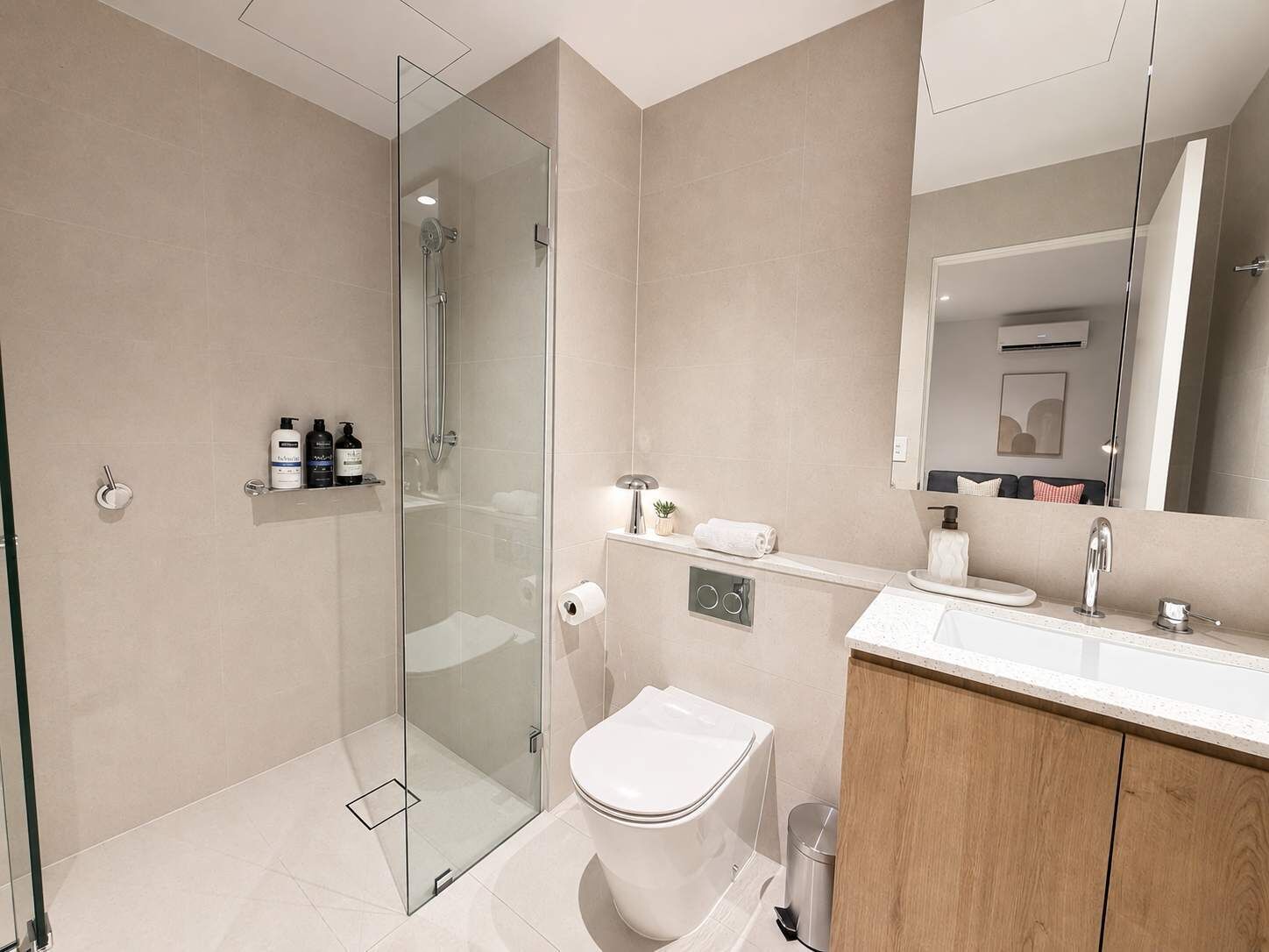 Shower, hair dryer, towels, shampoo