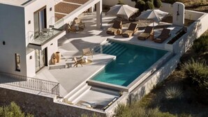 A modern villa with a swimming pool, sun loungers, and outdoor seating. - Villa Aelionis, Private Pool, Furnished Terrace, Zakynthos (Zakynthos)