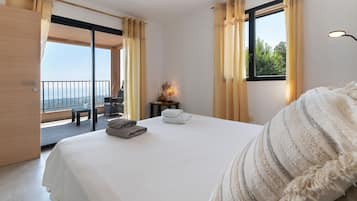 2 habitaciones, tabla de planchar con plancha y ropa de cama