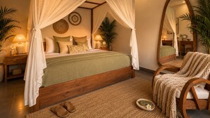 A bedroom with a four-poster canopy bed, bedside tables with lamps, a large mirror, and a woven rug. - Pavilion Pool Villa. Walk to Beach (Kecamatan Mengwi,)