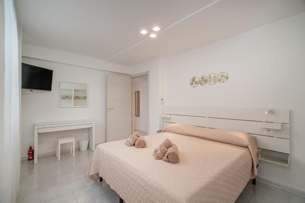 Habitación triple Confort | Cortinas opacas, tabla de planchar con plancha, wifi gratis