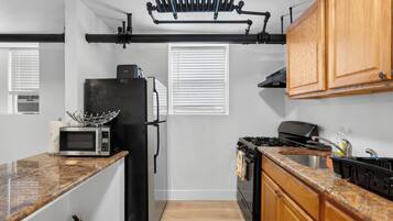 Coffee/tea maker, fridge, microwave, oven